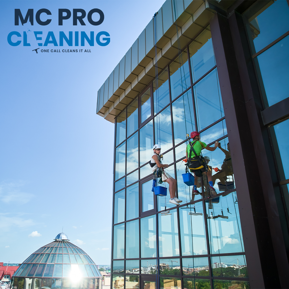 Professional cleaners washing office windows – McProCleaning services for a tidy and productive space